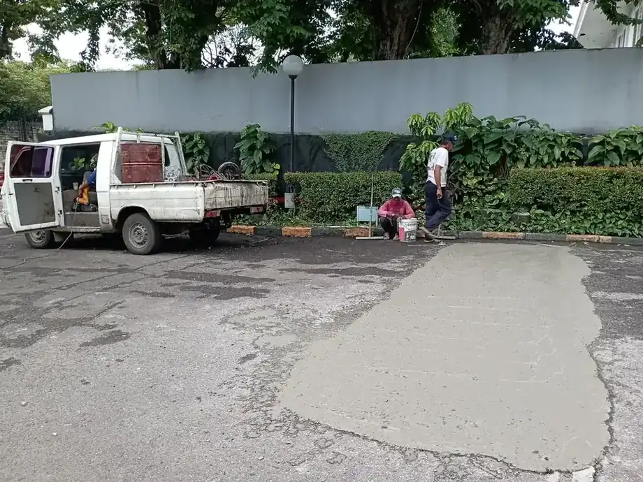 Pemasangan Pondasi Batu Makadam dan Lapis Base Course Sebelum Gelar Aspal Hotmix per M2